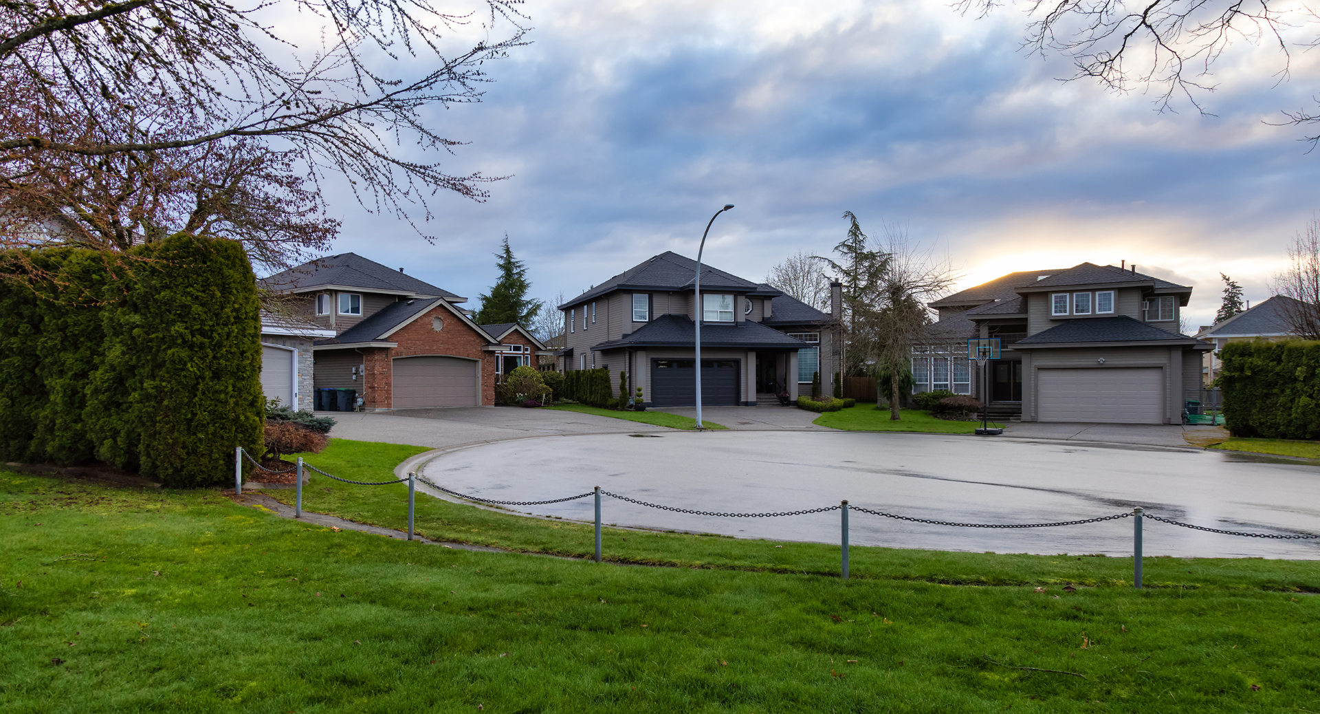 Concrete driveway across Willamette Valley homes